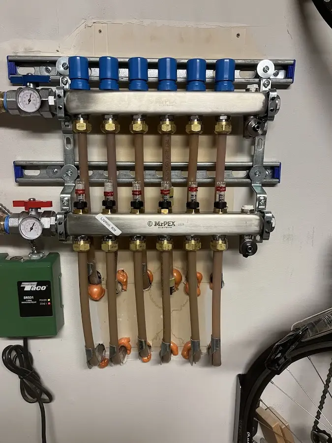 Plumber performing Water Heater Repair at a residential property in Levant